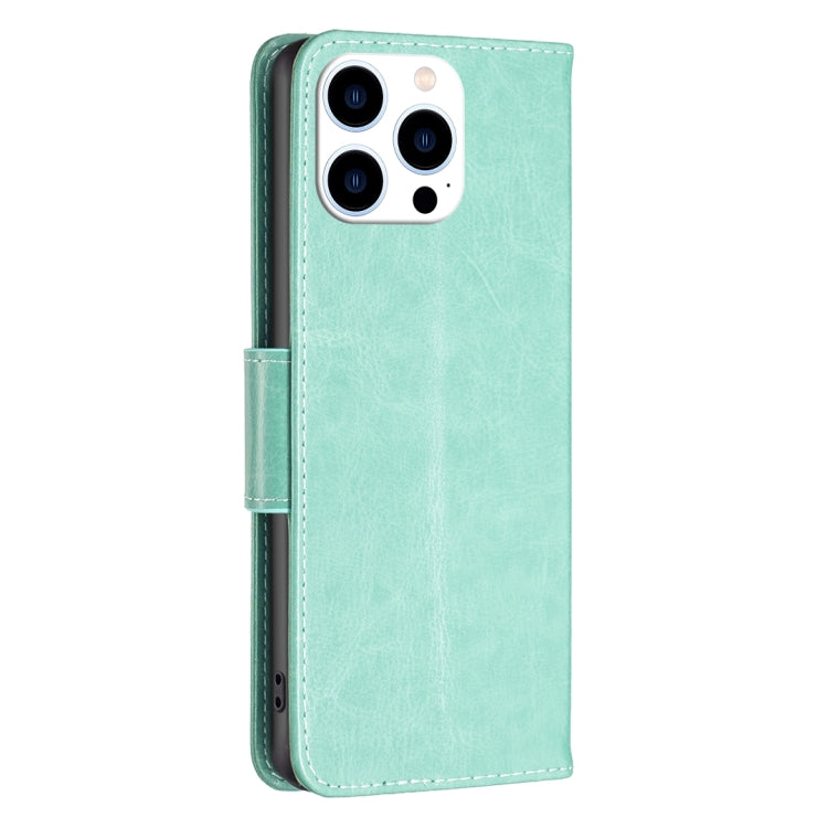 For iPhone 16 Pro Embossing Two Butterflies Pattern Leather Phone Case(Green) - iPhone 16 Pro Cases by PMC TechLife | Online Shopping South Africa | PMC TechLife | Buy Now Pay Later Mobicred