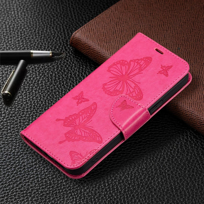 For iPhone 16 Embossing Two Butterflies Pattern Leather Phone Case(Rose Red) - iPhone 16 Cases by PMC Jewellery | Online Shopping South Africa | PMC Jewellery | Buy Now Pay Later Mobicred