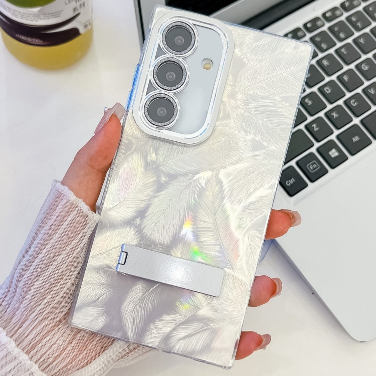 For Samsung Galaxy S25 5G Plating Glitter Texture Fold Holder TPU Phone Case with Lens Film(White Feathers) - Galaxy S25 5G Cases by PMC Jewellery | Online Shopping South Africa | PMC Jewellery | Buy Now Pay Later Mobicred